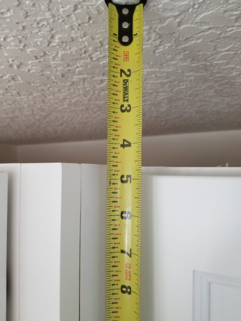 If the cabinets are installed, this quick measurement gives all the information needed to make riser moulding.