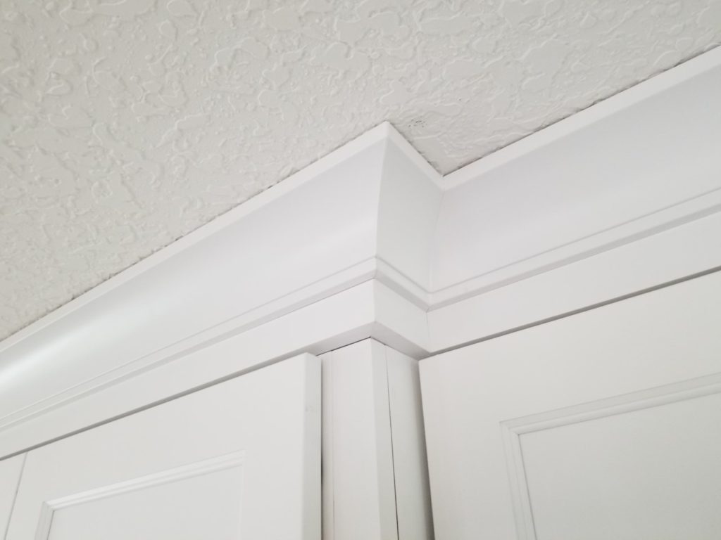 Riser moulding provides the foundation for the crown moulding