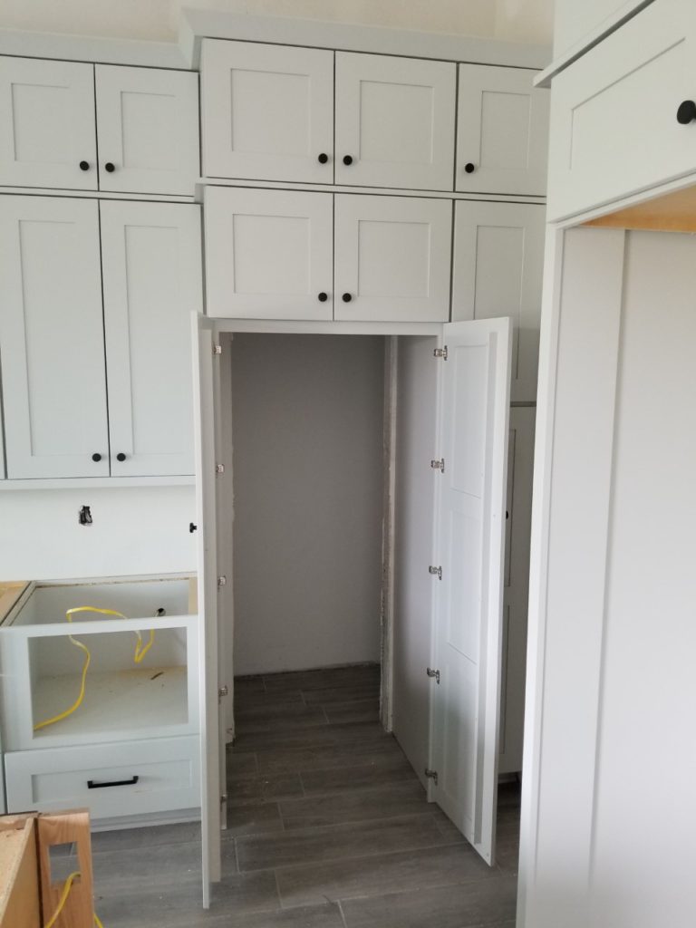 Installing Hidden Walk-in Pantry Cabinets (+How To Build Them)