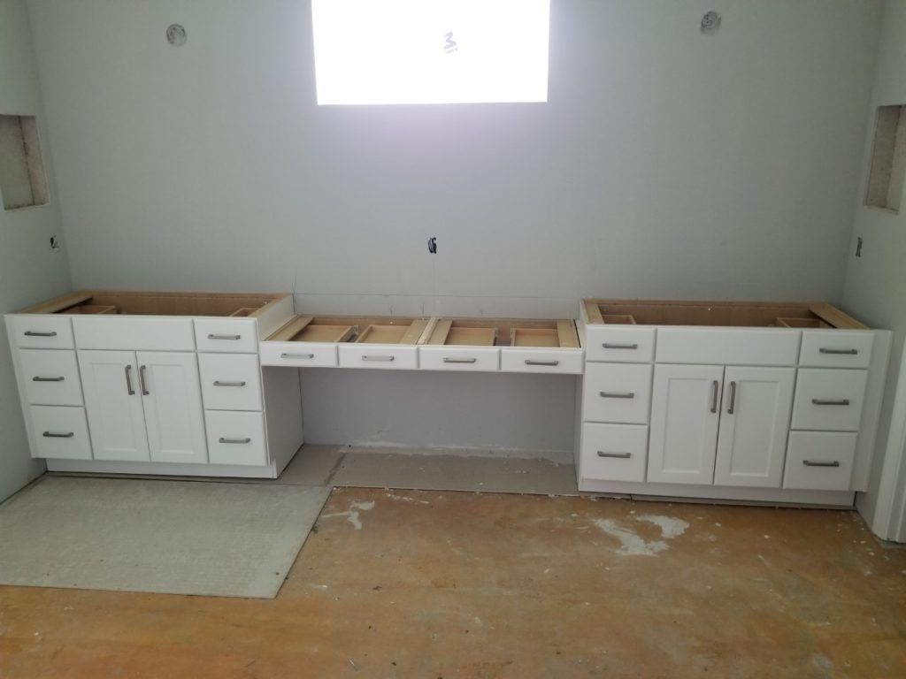 A fully installed double vanity desk (without tops).